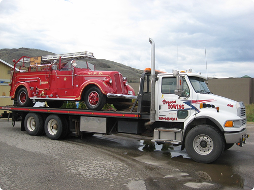 Tandem Tilt Deck Truck Service Available for Equipment Hauling image
